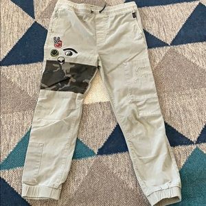 Cream with camo joggers.